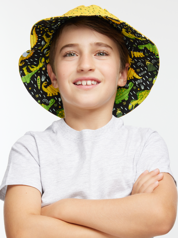 Tip na darček Chapéu alegre de criança Dino