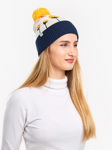 Hľadáte originálny a nezvyčajný darček? Obdarovaného zaručene prekvapí Berretto con pon-pon Buonumore Fiori invernali