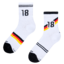 Foto Prążkowane skarpetki do połowy łydki Niemiecka legenda piłki nożnej 