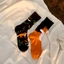 Lifestyle-Foto Lustige Socken Fuchs und Blüten