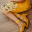 Lifestyle-Foto Lustige Nylonsocken Gänseblümchen