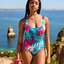 Szerezzen magának örömet ezzel a Dedoles darabbal Vidám egyrészes női fürdőruha Trópusi paradicsom