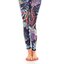 Lifestyle foto Dámske športové elastické legíny Neónové kvety