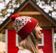 KNITTED BEANIES WITH A POM-POM ON THE TOP